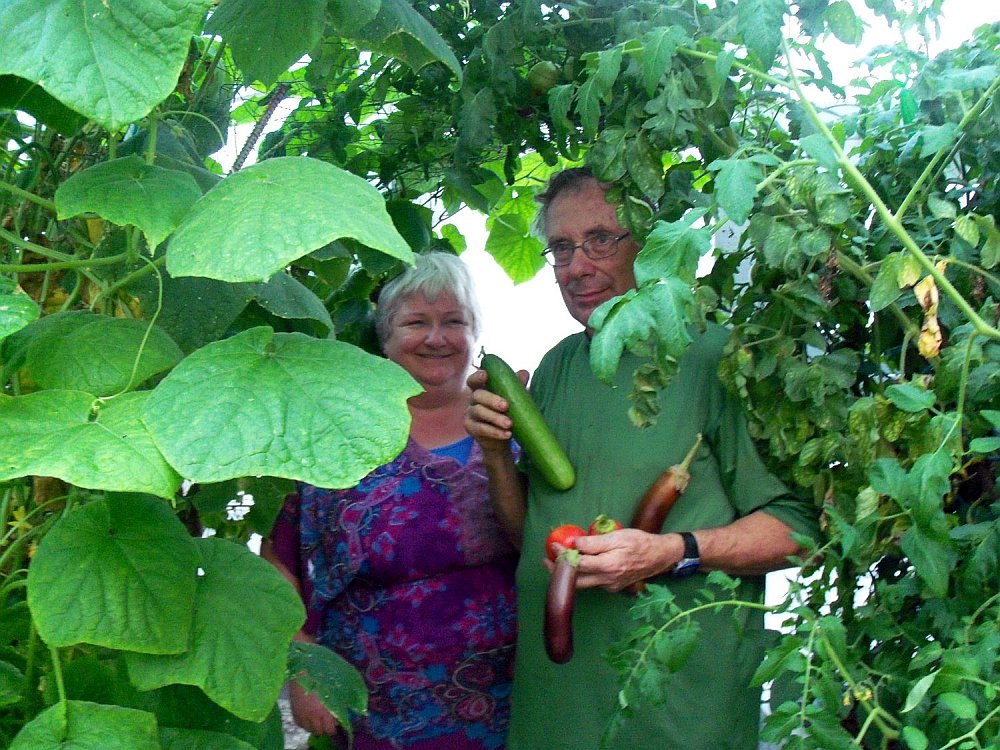 Bob and Margaret in our Clear Woven Poly A-Frame Greenhouse